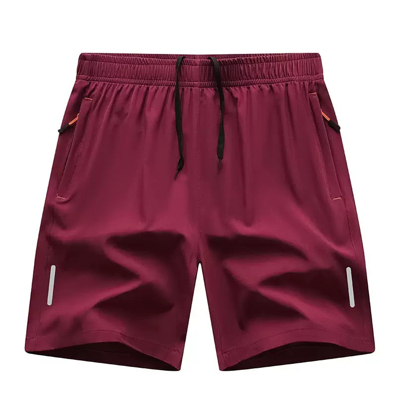 Quick-drying, elastic waistband, lightweight and stretchy; suitable for fitness training and running; features zippered pockets.